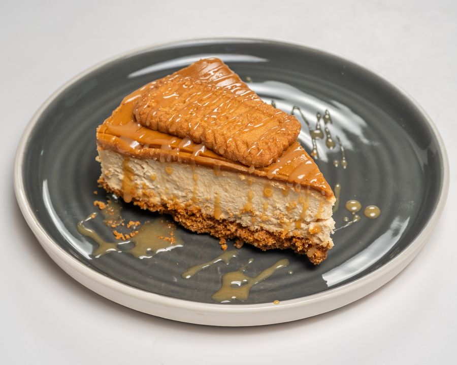 Biscoff cheesecake slice with caramel drizzle