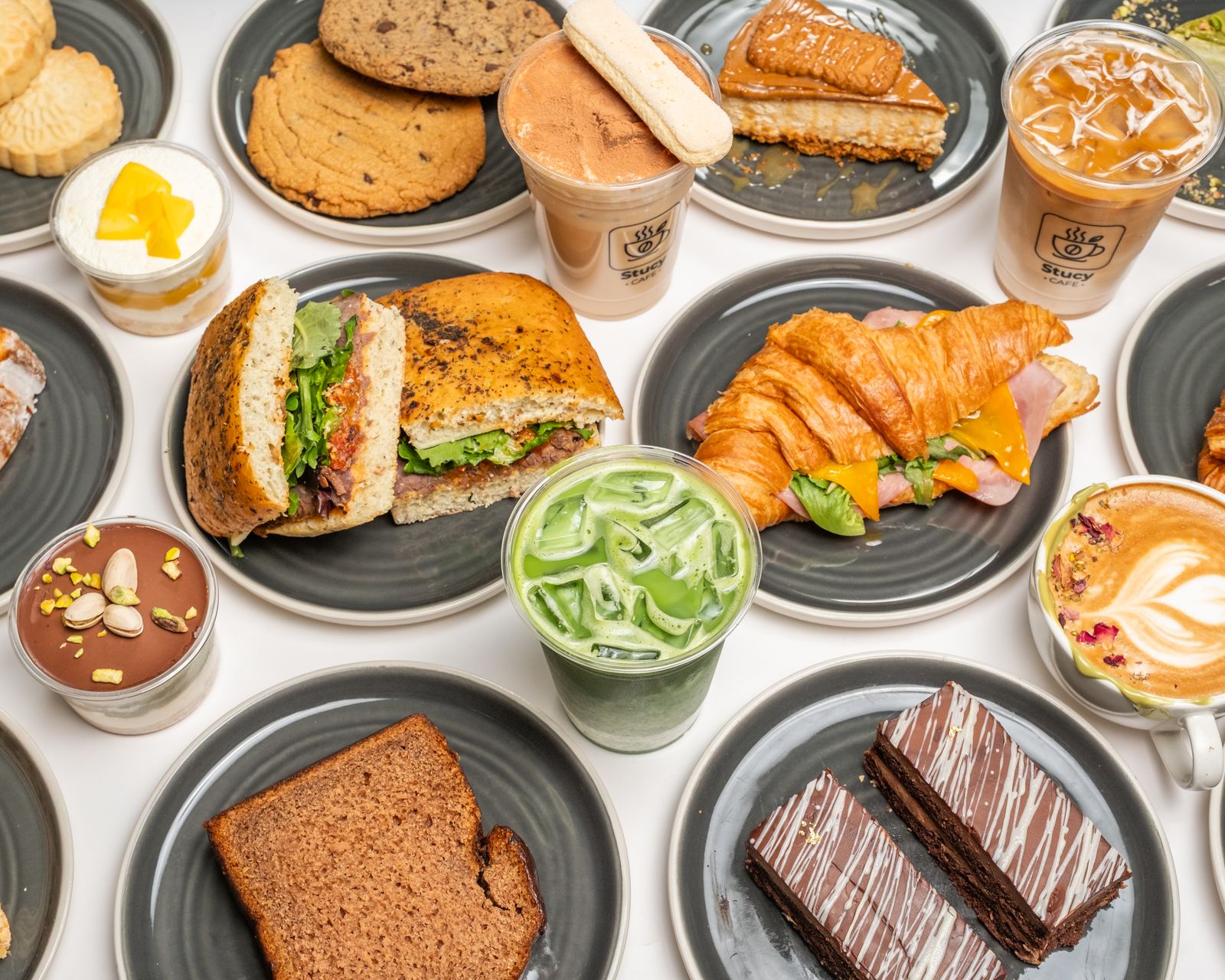 Spread of Stucy Cafe drinks, sandwiches and desserts