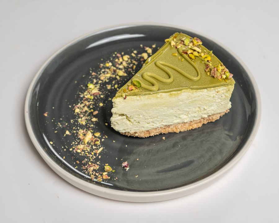 Pistachio cheesecake slice